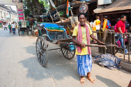 Rickshaw tirados por personas